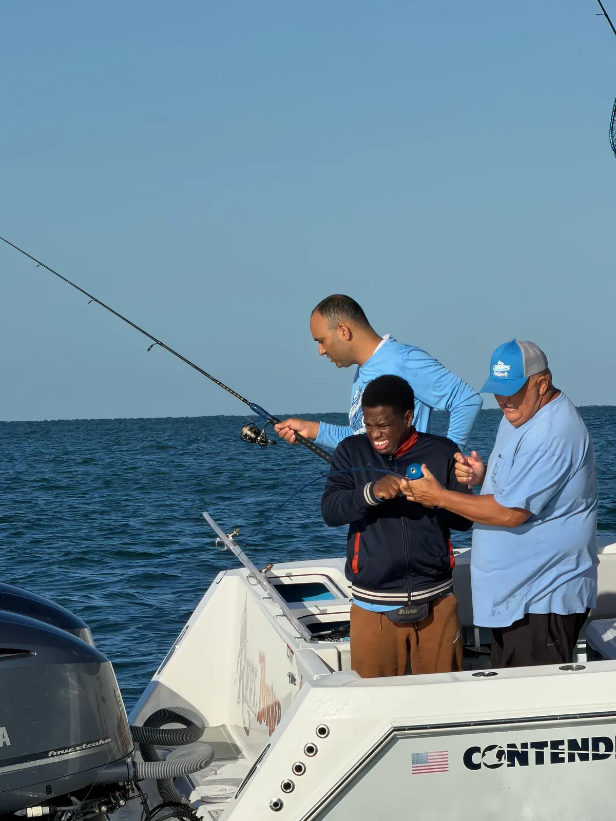 A guest fishes with help from volunteers — Friendliest Catch, October 20, 2026.