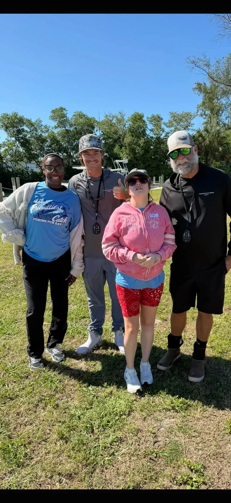 Event guests and volunteers together on shore — Friendliest Catch, October 20, 2026.